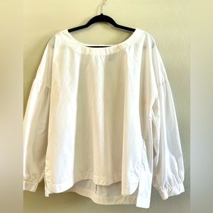 Plus size elegant white blouse.
